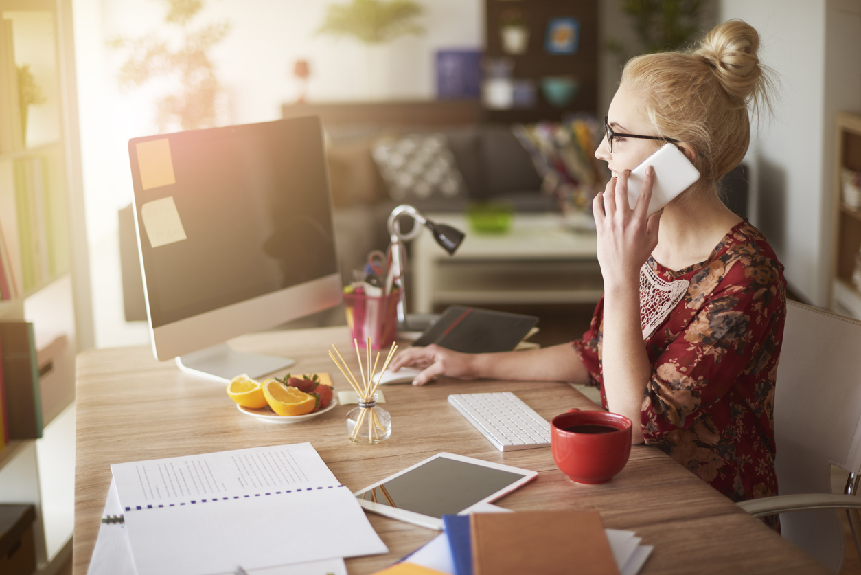 Woman in surroundings of digital technology